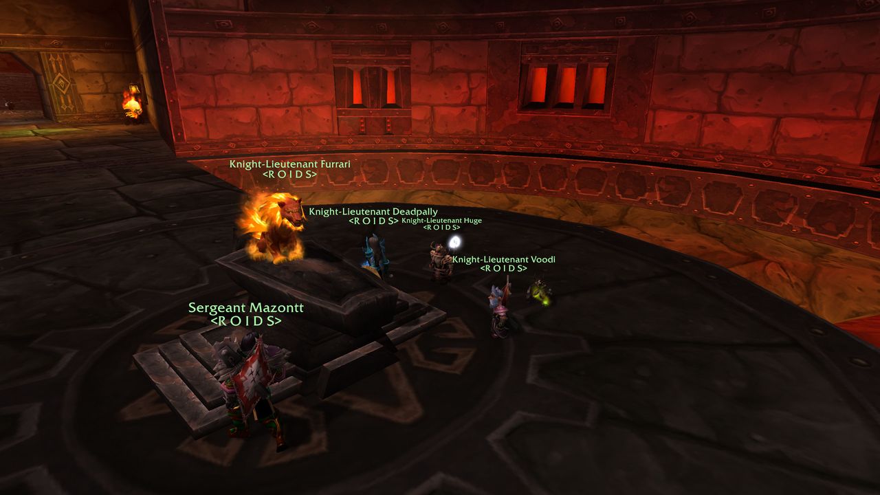 Six of us, all Knight-Lieutenant, on a dais in a red-stone amphitheatre